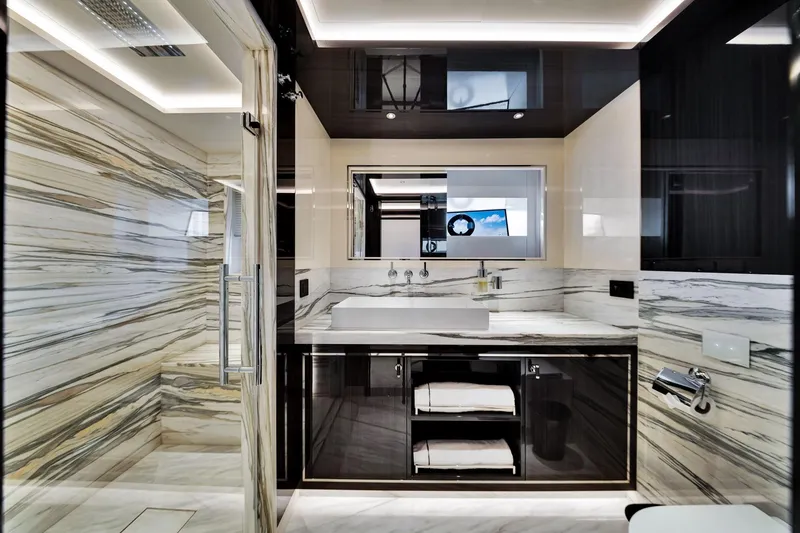 Slide: The Image of Luxurious bathroom interior of 2021 Sirena 88 yacht with marble accents and modern fixtures. - 102
