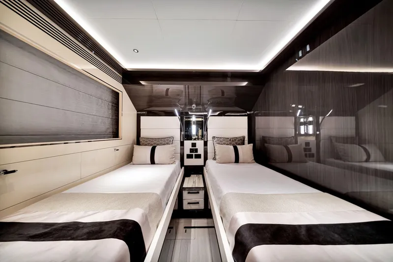 Slide: The Image of Luxurious twin bedroom interior on 2021 Sirena 88 yacht, featuring modern design and elegant decor. - 111