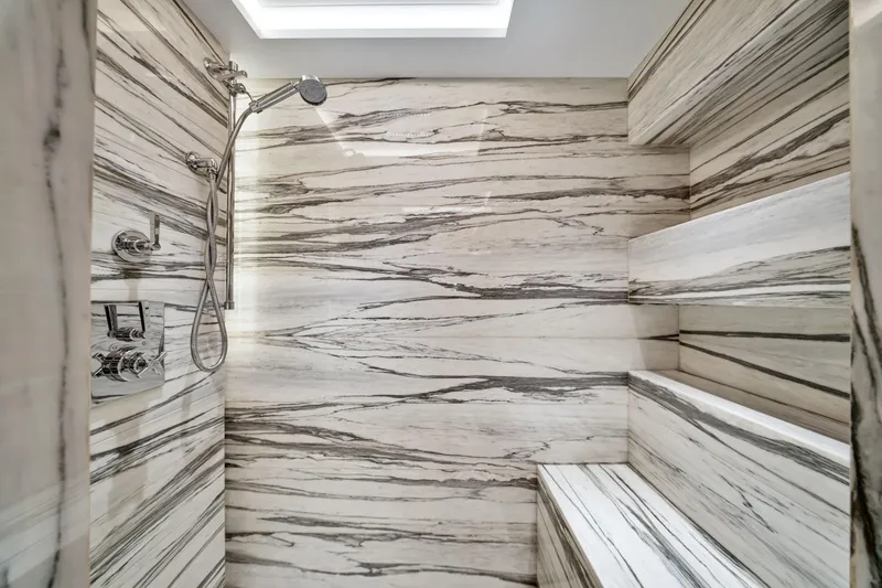 Slide: The Image of Luxurious marble shower interior in 2021 Sirena 88 yacht bathroom. - 115