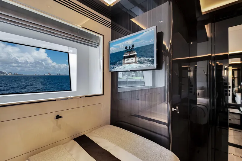Slide: The Image of Luxurious interior of 2021 Sirena 88 yacht with ocean view and mounted TV. - 119
