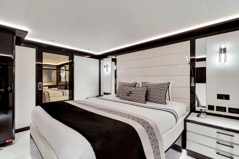 Slide: The Image of Luxurious bedroom interior on 2021 Sirena 88 yacht, featuring elegant design and modern lighting. - 124