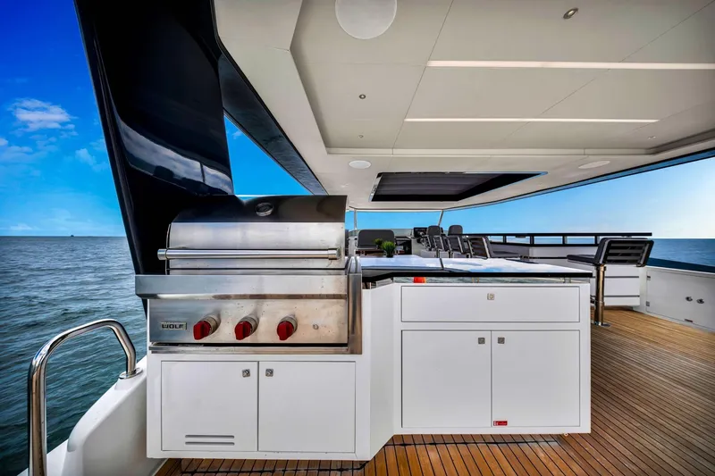 Slide: The Image of Outdoor kitchen on 2021 Sirena 88 yacht with ocean view and modern grill. - 14