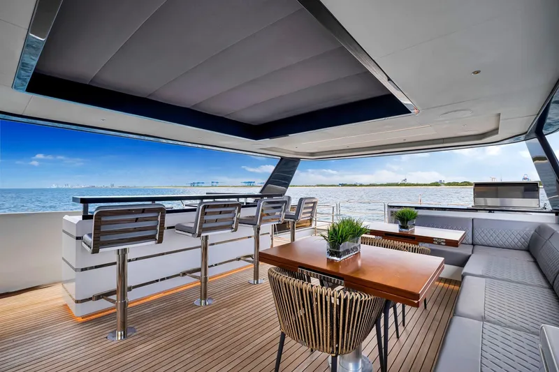 Slide: The Image of Luxurious 2021 Sirena 88 yacht deck with modern seating and ocean view. - 18