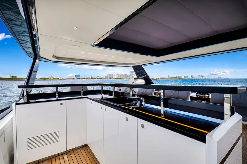 Slide: The Image of Luxurious 2021 Sirena 88 yacht interior with modern kitchen and ocean view. - 22