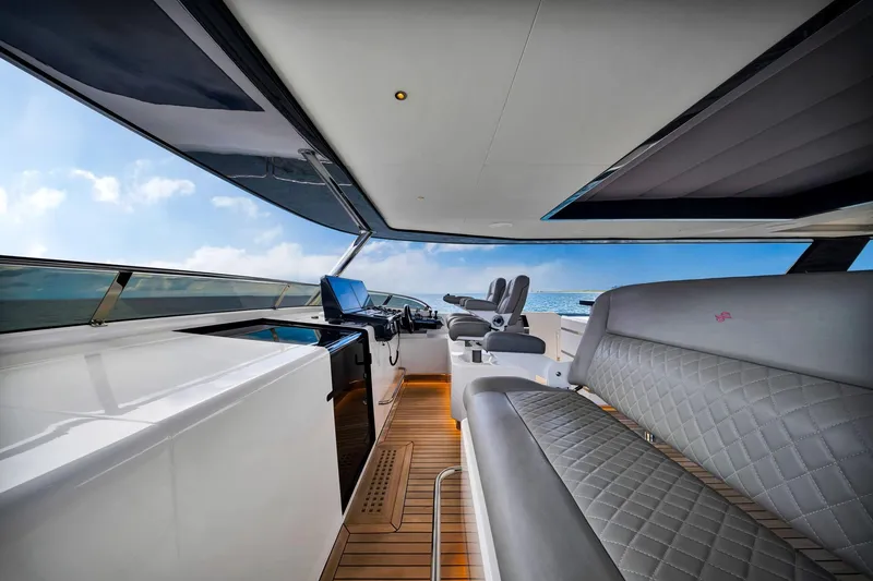 Slide: The Image of Luxurious interior of 2021 Sirena 88 yacht with modern seating and ocean view. - 24