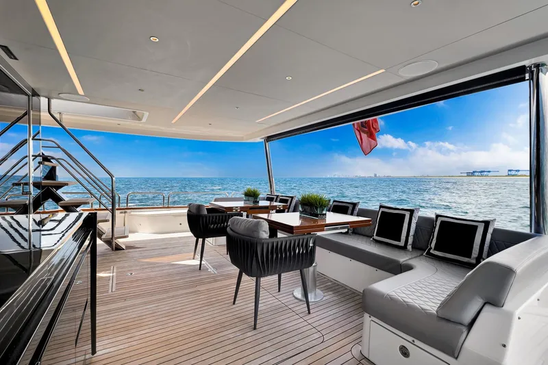 Slide: The Image of Luxurious 2021 Sirena 88 yacht deck with elegant seating, ocean view, and modern design. - 42