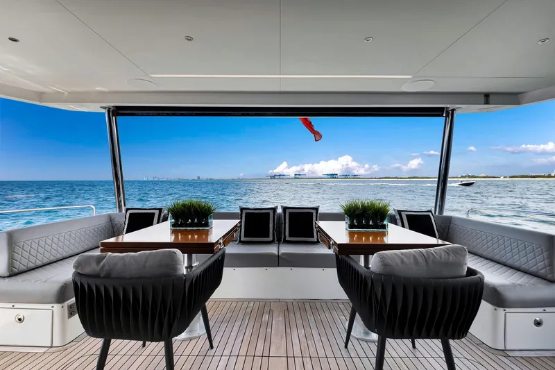 Slide: The Image of Luxurious 2021 Sirena 88 yacht deck with elegant seating and ocean view. - 44