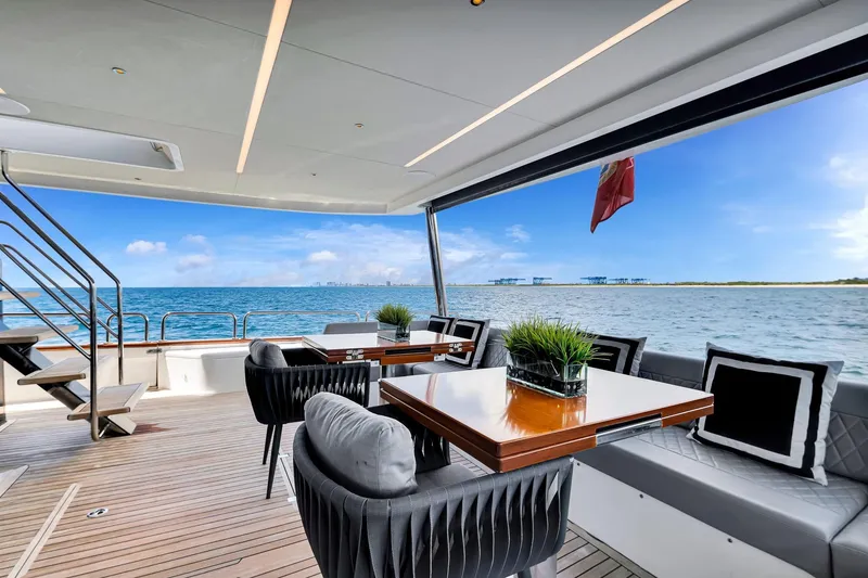 Slide: The Image of Luxurious 2021 Sirena 88 yacht deck with elegant seating and ocean view. - 45