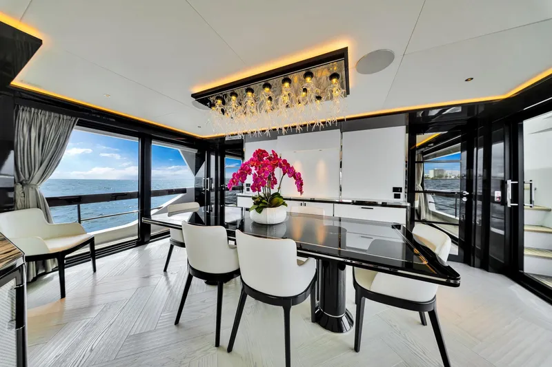 Slide: The Image of Luxurious interior of 2021 Sirena 88 yacht with elegant dining area and ocean view. - 58