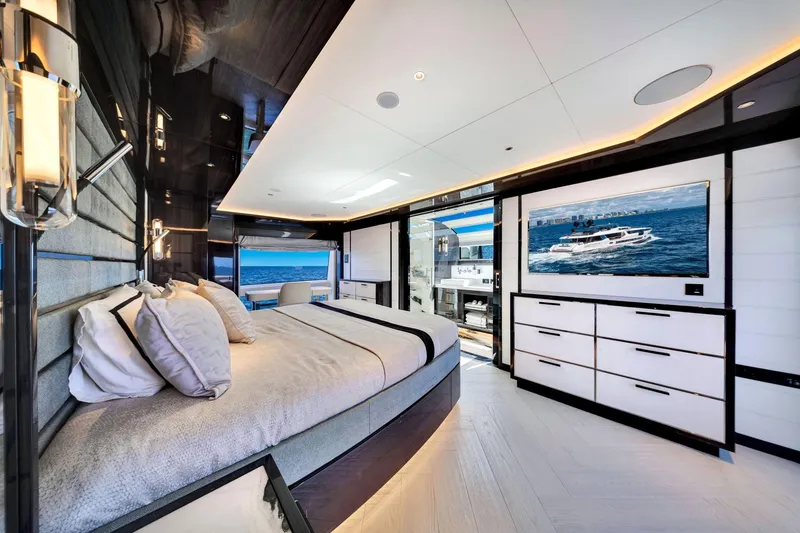 Slide: The Image of Luxurious Sirena 88 yacht bedroom interior, featuring modern design and ocean views, 2021 model. - 69