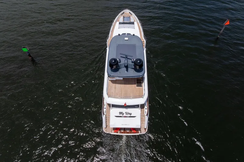 Slide: The Image of Aerial view of 2021 Sirena 88 yacht cruising on open water. - 8