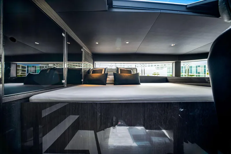 Slide: The Image of Luxurious interior of 2021 Sirena 88 yacht with modern design and plush bedding. - 90