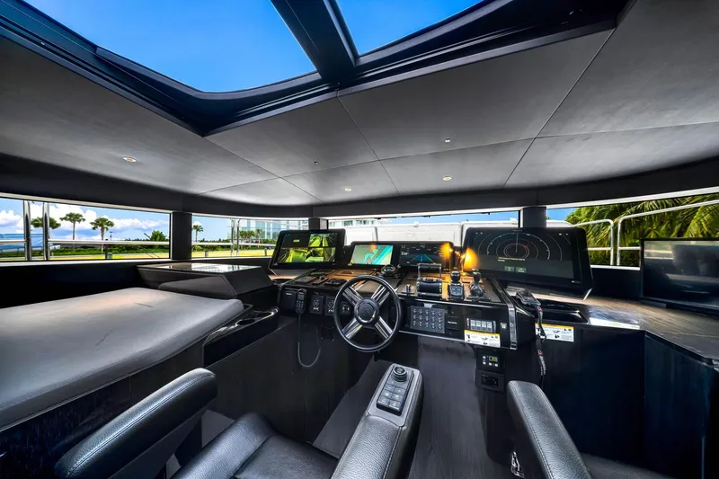 Slide: The Image of Luxurious 2021 Sirena 88 yacht cockpit with advanced navigation systems and panoramic views. - 91