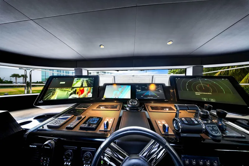Slide: The Image of Cockpit of 2021 Sirena 88 yacht with advanced navigation and control systems. - 93