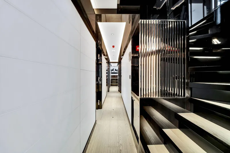Slide: The Image of Luxurious interior hallway of 2021 Sirena 88 yacht, featuring sleek modern design. - 99