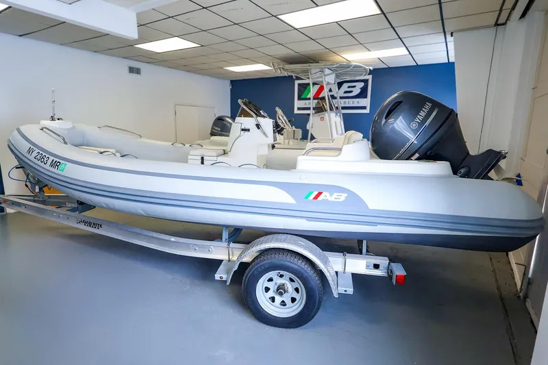 The Image of 2022 AB Inflatables Oceanus 17 VST boat on trailer in showroom. - 0