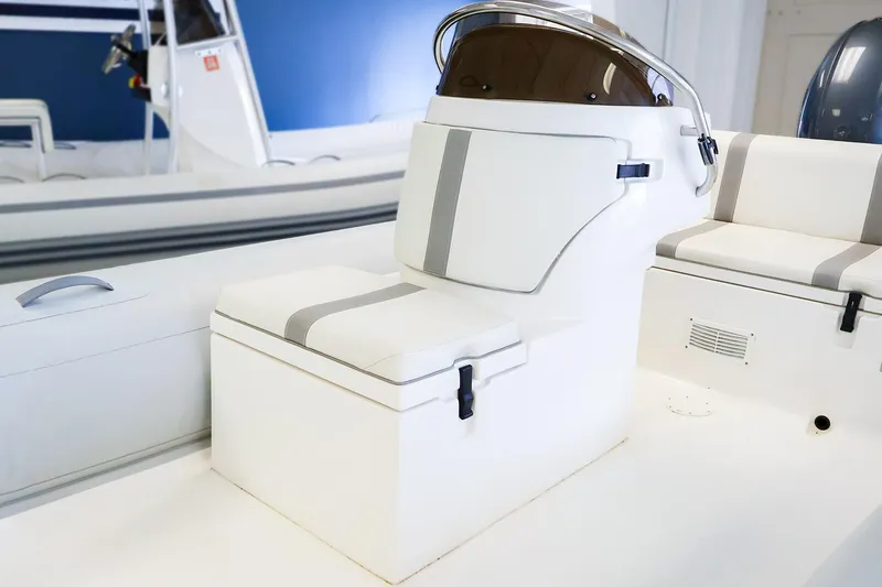 Slide: The Image of 2022 AB Inflatables Oceanus 17 VST boat interior with white seating and console. - 10