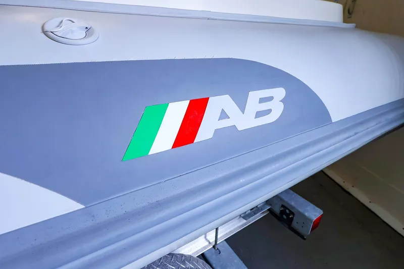 Slide: The Image of 2022 AB Inflatables Oceanus 17 VST boat logo on gray hull. - 16
