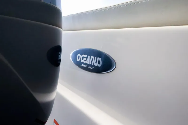 Slide: The Image of 2022 AB Inflatables Oceanus 17 VST boat logo on white surface. - 23