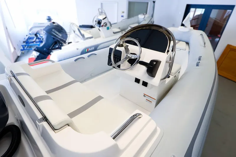 Slide: The Image of 2022 AB Inflatables Oceanus 17 VST boat interior with steering console and seating. - 3