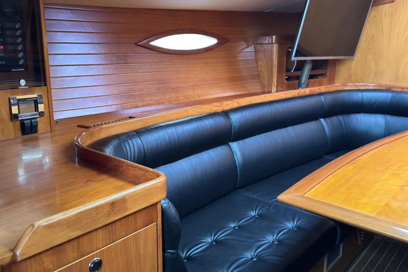 Slide: The Image of Luxurious interior of 2004 Alliaura FEELING 44 DI yacht with leather seating and wooden finishes. - 33