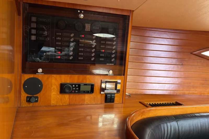 Slide: The Image of Control panel of 2004 Alliaura FEELING 44 DI yacht with wooden interior. - 34