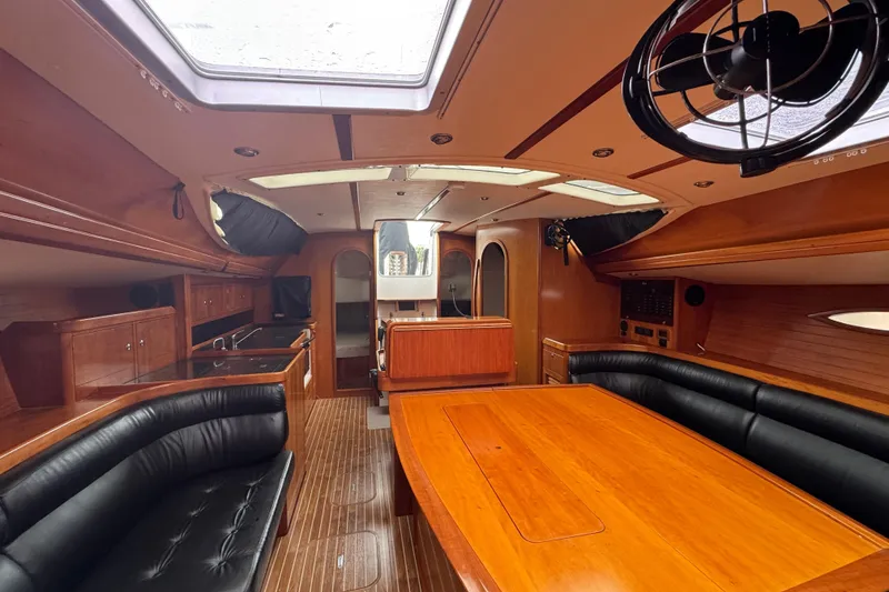 Slide: The Image of Luxurious interior of 2004 Alliaura FEELING 44 DI yacht with wood finish and skylights. - 43