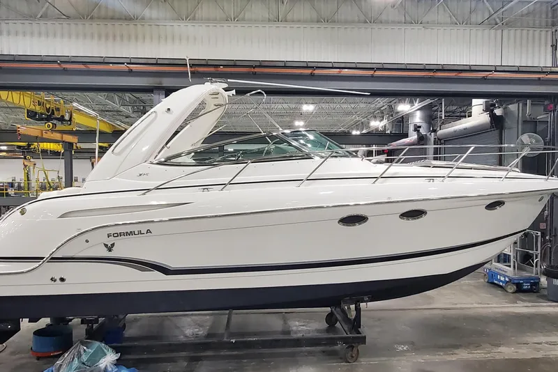 The Image of 2010 Formula 31 Performance Cruiser in a workshop setting. - 1