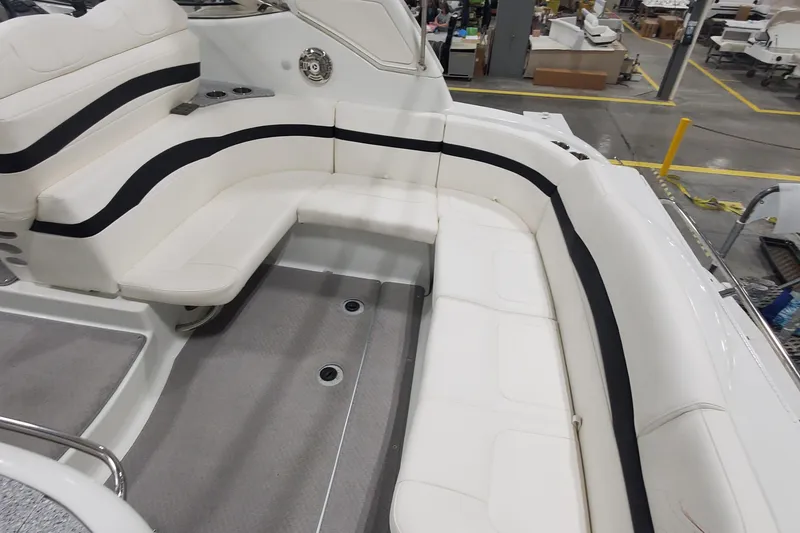 Slide: The Image of 2010 Formula 31 Performance Cruiser interior with white seating and black accents. - 10