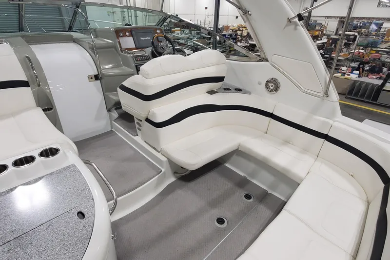 Slide: The Image of 2010 Formula 31 Performance Cruiser interior with plush seating and modern dashboard. - 12