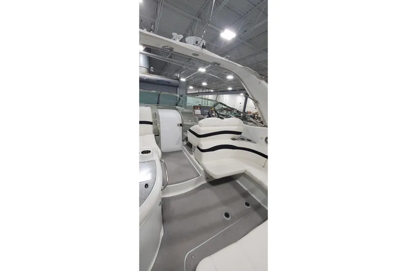 Slide: The Image of 2010 Formula 31 Performance Cruiser interior with white seating and modern design. - 13