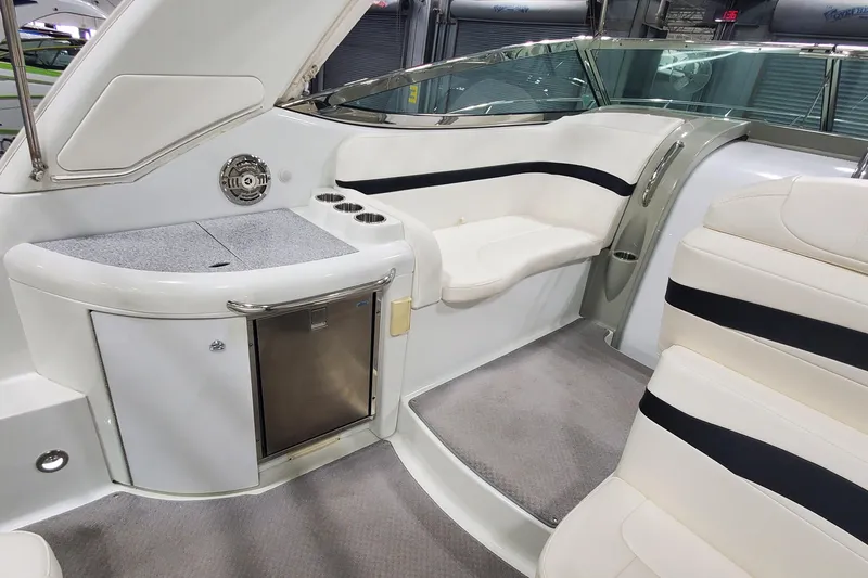 Slide: The Image of 2010 Formula 31 Performance Cruiser interior with seating and mini fridge. - 15