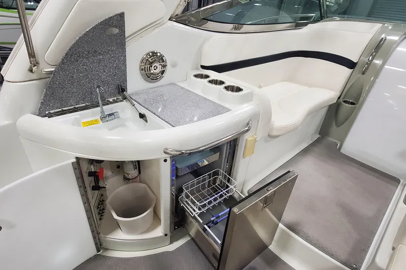 Slide: The Image of 2010 Formula 31 Performance Cruiser interior with kitchenette and seating area. - 16