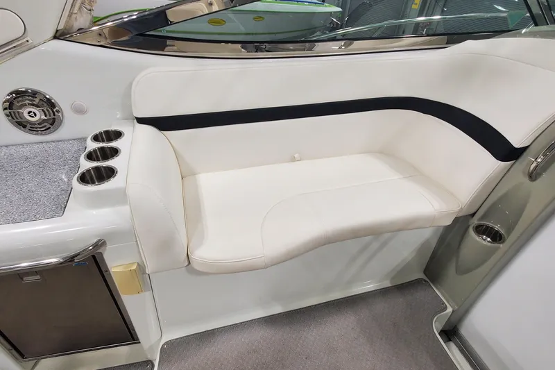 Slide: The Image of 2010 Formula 31 Performance Cruiser interior with white seating and cup holders. - 21