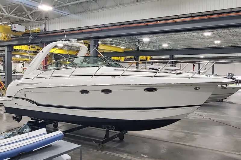 Slide: The Image of 2010 Formula 31 Performance Cruiser in a showroom, side view. - 3