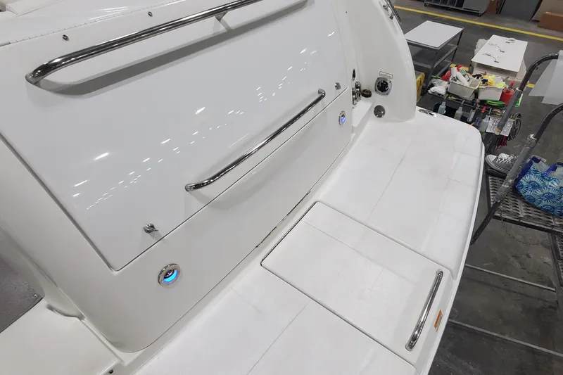 Slide: The Image of 2010 Formula 31 Performance Cruiser, white deck with stainless steel railings. - 35