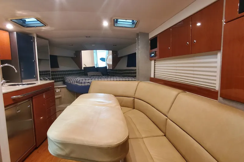 Slide: The Image of Luxurious interior of 2010 Formula 31 Performance Cruiser with seating and kitchenette. - 37