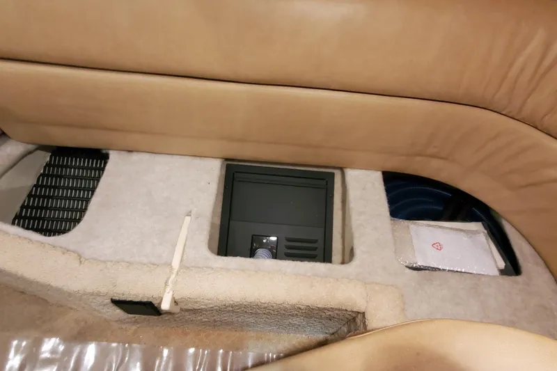 Slide: The Image of Interior view of a 2010 Formula 31 Performance Cruiser, featuring seating and storage compartments. - 41