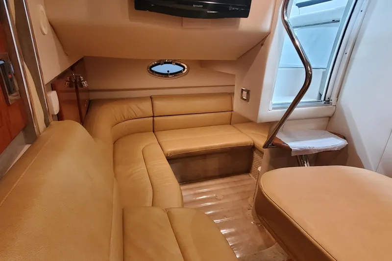 Slide: The Image of 2010 Formula 31 Performance Cruiser interior with beige seating and modern design. - 46