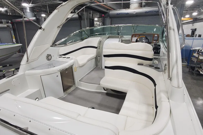 Slide: The Image of 2010 Formula 31 Performance Cruiser interior with white seating and modern dashboard. - 5