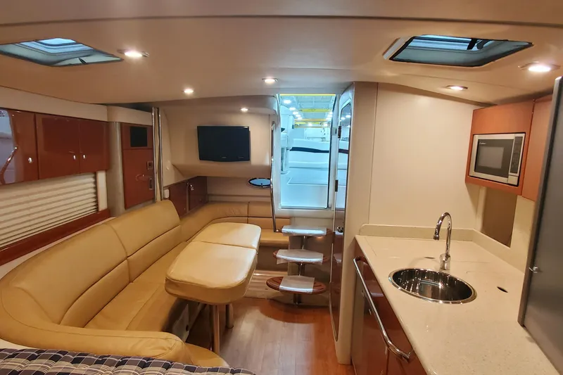 Slide: The Image of Luxurious interior of 2010 Formula 31 Performance Cruiser with modern amenities and elegant design. - 51