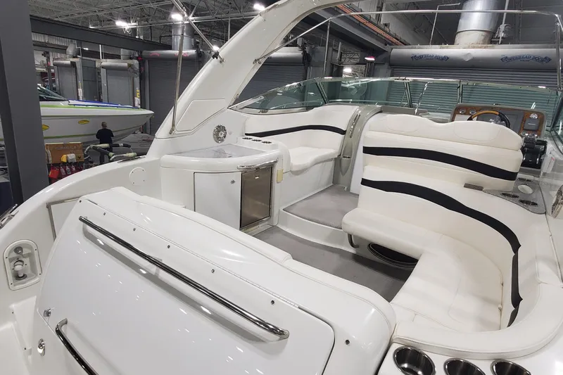 Slide: The Image of 2010 Formula 31 Performance Cruiser interior with white seating and modern amenities. - 6