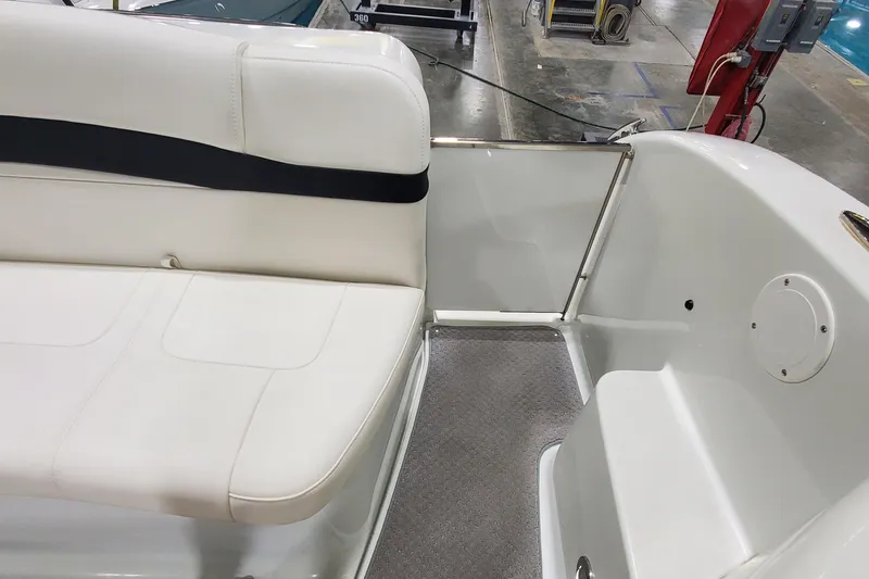 Slide: The Image of 2010 Formula 31 Performance Cruiser interior with white seating and carpeted floor. - 9