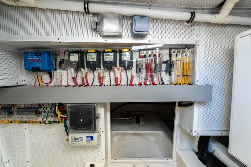 Slide: The Image of Electrical panel of 2023 Granocean 57 yacht with wiring and components. - 22