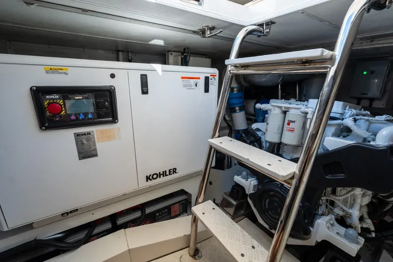 Slide: The Image of Engine room of 2023 Granocean 57 yacht with Kohler generator and ladder access. - 23