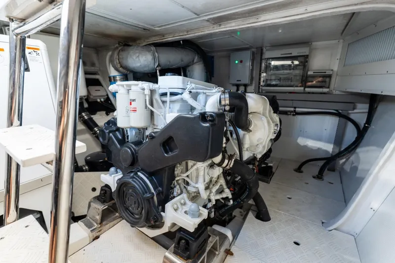 Slide: The Image of Engine room of 2023 Granocean 57 yacht, showcasing modern marine engine and equipment. - 24