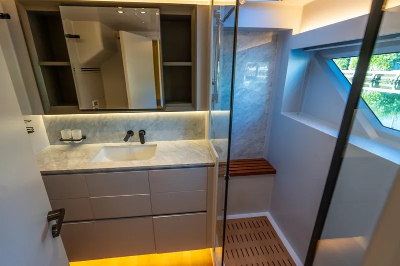 Slide: The Image of Luxurious Granocean 57 yacht bathroom with modern fixtures and elegant marble accents, 2023 model. - 27
