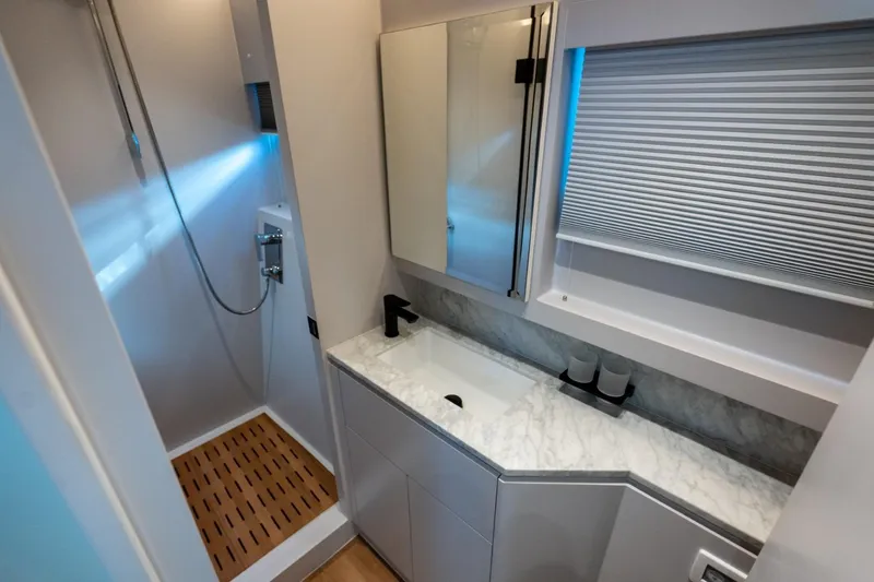 Slide: The Image of Luxurious bathroom in 2023 Granocean 57 yacht with marble countertop and modern shower. - 32