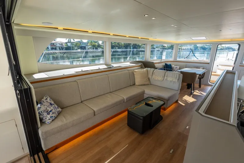 Slide: The Image of Luxurious interior of 2023 Granocean 57 yacht with spacious seating and panoramic windows. - 37