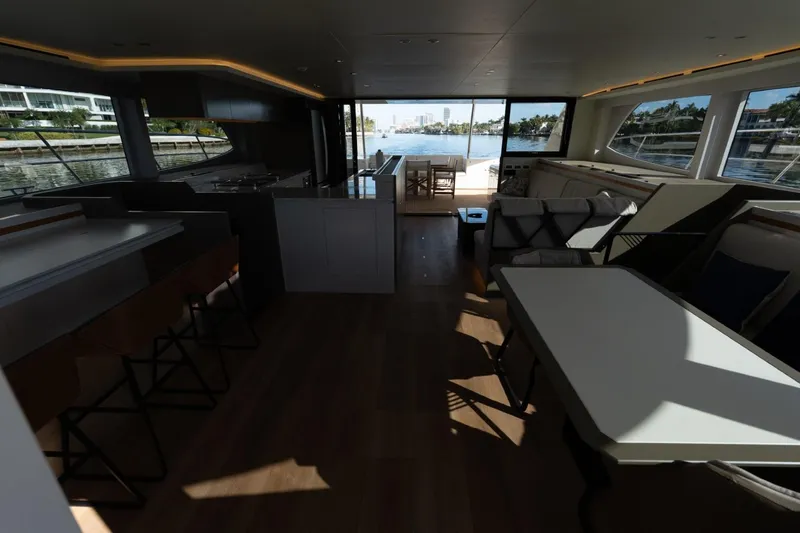 Slide: The Image of Luxurious interior of 2023 Granocean 57 yacht with modern furnishings and waterfront view. - 42